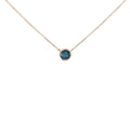 14K rose gold necklace with bezel-set blue diamond solitaire pendant