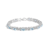 925 sterling silver butterfly link bracelet with oval blue topaz and diamond stones thumbnail 1