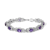 Sterling silver bracelet with oval purple amethyst stones in diamond halo links thumbnail 1