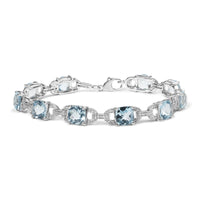 .925 Sterling Silver 7x7 mm Cushion Cut Blue Topaz and 1/20 cttw Round Cut Diamond Fashion Tennis Bracelet (I-J Color, I1-I2 Clarity) - 7