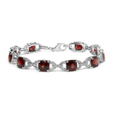 925 sterling silver bracelet with cushion red garnet and round diamond accent stones thumbnail 1