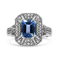 925 sterling silver ring with emerald-cut blue topaz and diamond accent stones