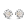 925 sterling silver earrings with pear diamonds and central pearl in floral twist