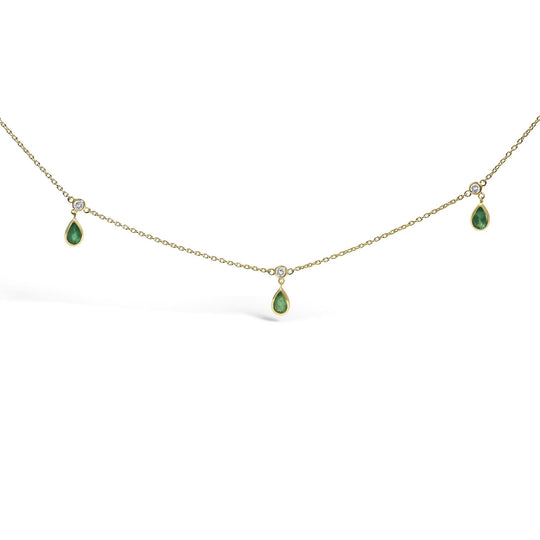 10K yellow gold necklace with dangling green emerald and diamond stations
