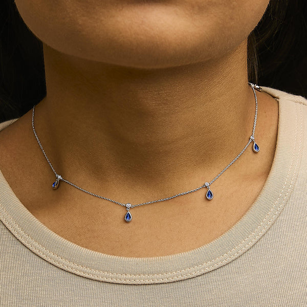 10K White Gold Dangling 5x3 mm Pear Blue Sapphire and Diamond Station Necklace - 18