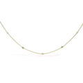 14K yellow gold necklace with alternating bezel-set emerald and diamond stones