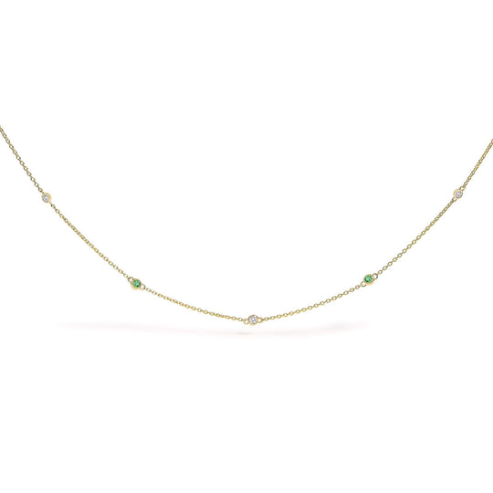 14K yellow gold necklace with alternating bezel-set emerald and diamond stones