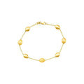 14K yellow gold textured pebble station bracelet