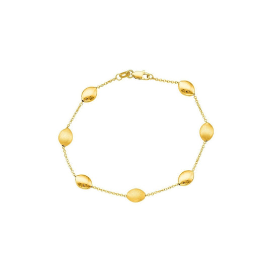 14K yellow gold textured pebble station bracelet