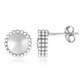 Sterling silver 925 beaded ring with round texture detailing along the band
