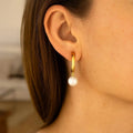 14K yellow gold half hoop earrings with pear pearl stones