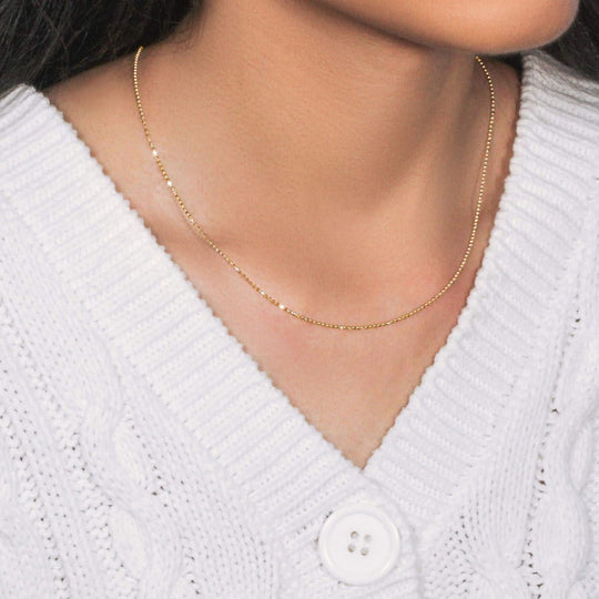 14K yellow gold diamond-cut bead chain in a fine 1.10 mm gauge