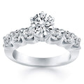 14K white gold ring with shared prong diamond stones set across the band
