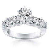 14K white gold ring with shared prong diamond stones set across the band thumbnail 1