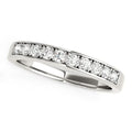 14K white gold ring with channel-set round diamonds across the band