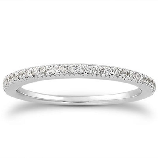 14K white gold ring with pave-set diamond stones on an engraved band