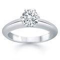 14K white gold solitaire cathedral engagement ring with raised center setting