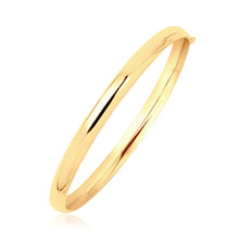 Load image into Gallery viewer, 14k Yellow Gold Dome Design Polished Childrens Bangle (5.50 mm)