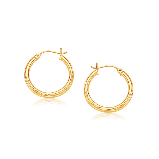 14K yellow gold hoop earring with diamond-cut faceted finish, 3x25mm