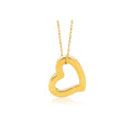 14K yellow gold heart pendant with polished face and integrated bail