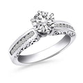 14K white gold channel set engagement ring with engraved sides
