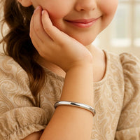 14k White Gold Dome Children's Bangle with a Polished Finish