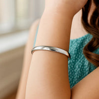 14k White Gold Dome Children's Bangle with a Polished Finish