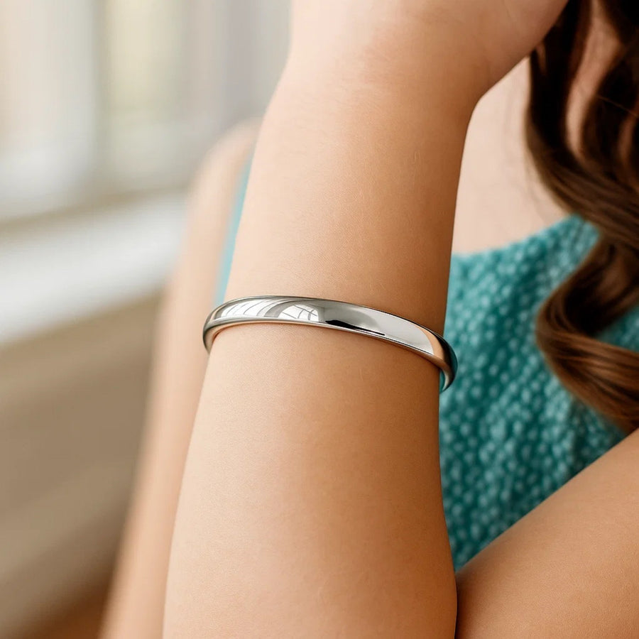 14k White Gold Dome Children's Bangle with a Polished Finish