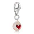 Sterling silver egg charm with red heart-shape crystal accents in center