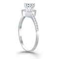 14K white gold ring with round diamond center and halo diamond stones