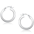 14K white gold flat side hoop earrings with clean polished profile