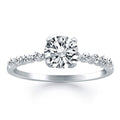 14K white gold engagement ring with shared prong diamond accent stones
