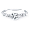 14K white gold ring with shared prong accent diamond stones