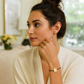 14k yellow gold circle on black adjustable cord bracelet