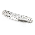 14K white gold curved wedding band with round diamond stones
