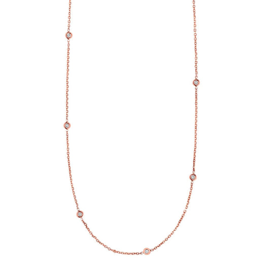 14K rose gold diamonds by the yard necklace with spaced round diamond stations
