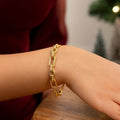 14K yellow gold polished and textured link bracelet, 6.30 mm width