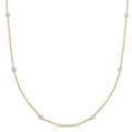 14K yellow gold Diamonds by the Yard necklace with spaced round diamond stations