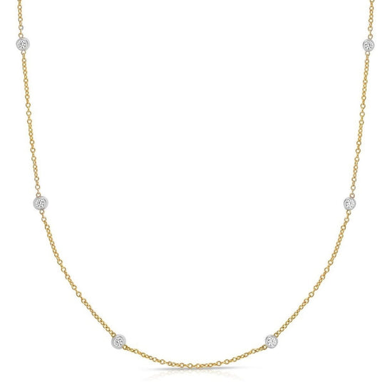 14K yellow gold Diamonds by the Yard necklace with spaced round diamond stations