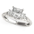 14K white gold ring with 3 princess diamond stones