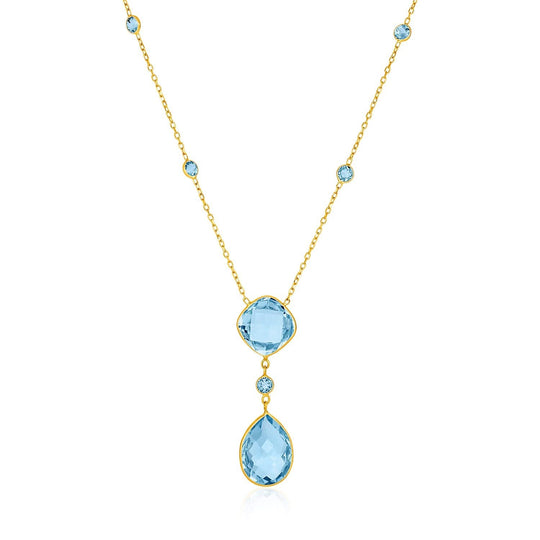 14K yellow gold necklace with pear and cushion blue topaz briolette stones