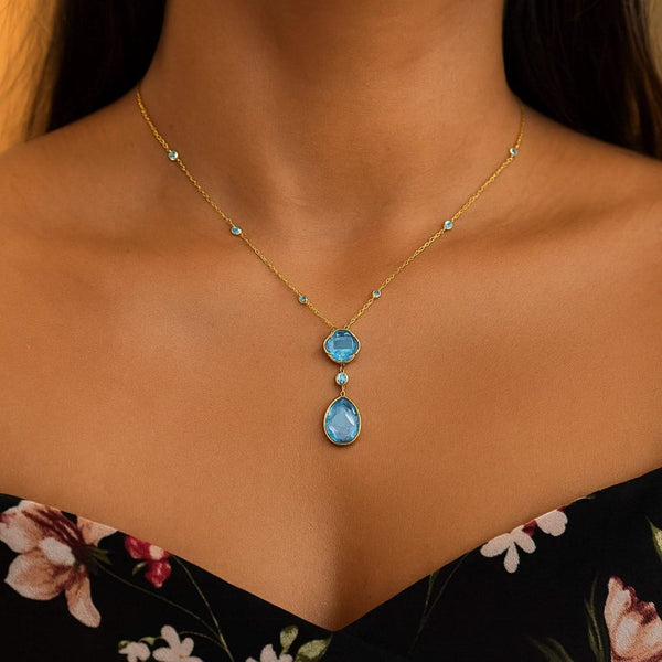 14k Yellow Gold Necklace with Pear-Shaped and Cushion Blue Topaz Briolettes