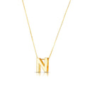 14K yellow gold block letter N initial necklace on a chain