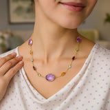 14K yellow gold necklace with multi-colored stones set along the chain thumbnail 1