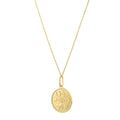14K yellow gold lucky charms necklace with multiple gold charm pendants