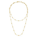 14K yellow gold pyramid station layered necklace with faceted geometric beads