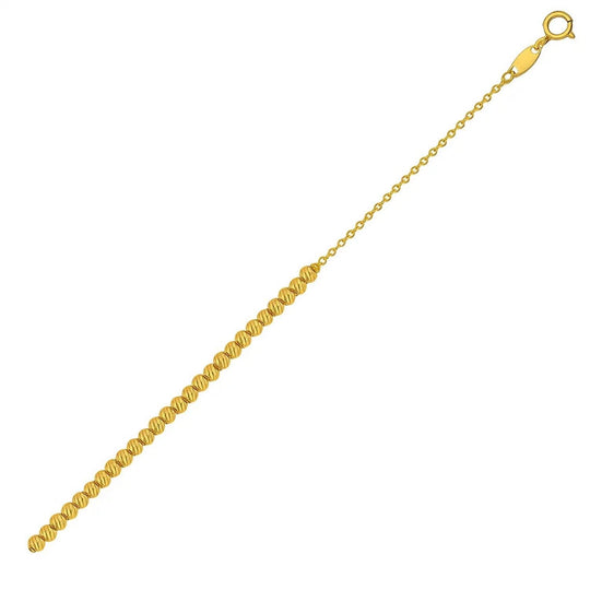 14K yellow gold bracelet with diamond cut beads