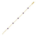 14K yellow gold station bracelet with round amethyst stones