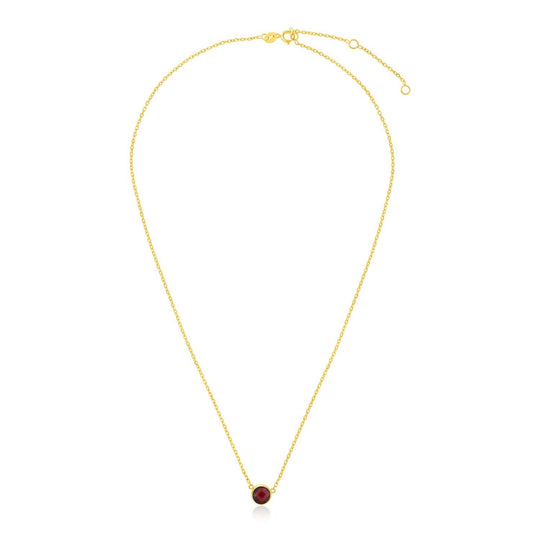 14K yellow gold necklace with round garnet stone on 17 inch chain