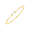 14K yellow gold bangle with cluster diamond stones and high polish finish